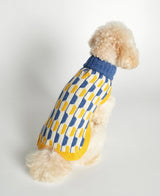 White poodle toy wearing our White Caniche Toy wearing our Donald Red & Pink Merino Wool Dog Sweater back view