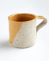 Yellow handmade ceramic cup
