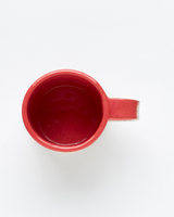 Handmade red ceramic mug inside view